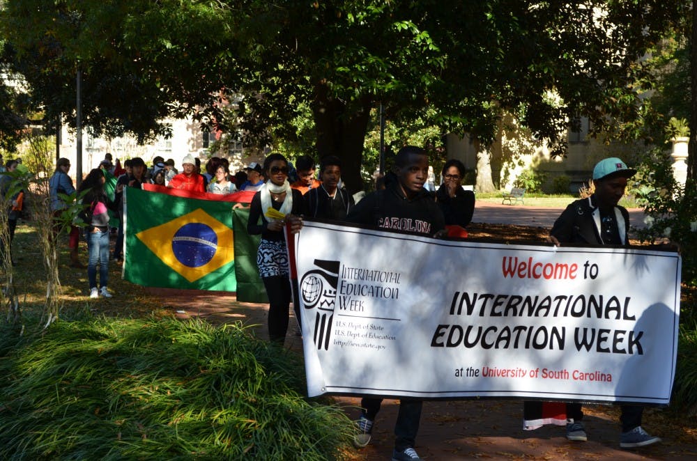 	Celebrating the diversity of cultures on campus, international students paraded through campus Monday. International education events continue all week.