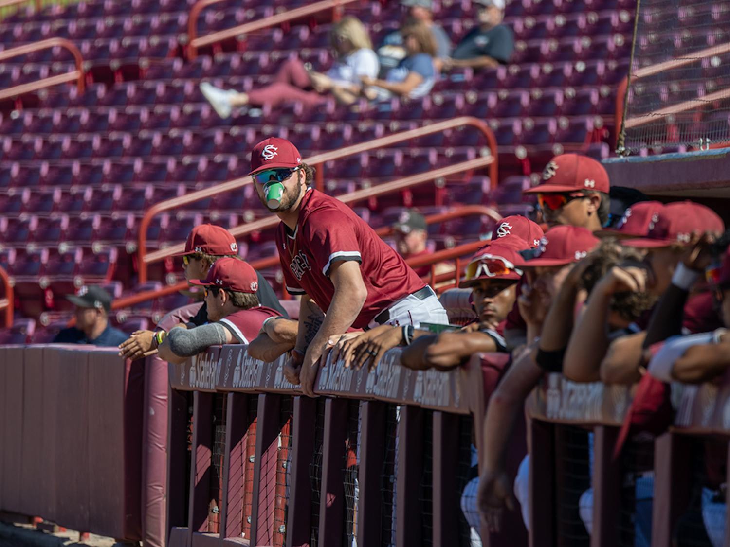 FILE—The South Carolina baseball team in the dugout during its first scrimmage against UNCW at Founders Park on Oct. 23, 2021. The Gamecocks tied the first game and won the second game.