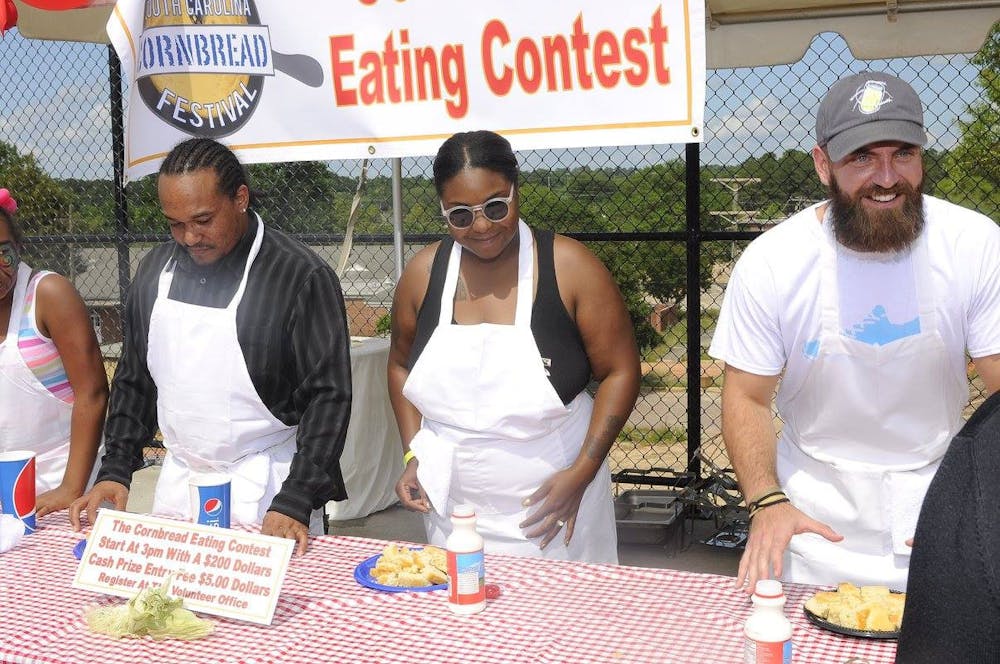 <p>Participants get ready to compete in the South Carolina Cornbread Festival's cornbread eating contest in 2016. This year's festival will be held on Sunday, April 30, from 11 a.m. to 6 p.m.</p>
