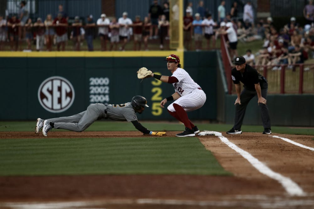 <p>Junior first baseman Gavin Casas catches the ball at first base, striking out the Mizzou opponent after he attempted to steal second base. The Gamecocks take home a 9-8 win in Founders Park on March 23, 2023.&nbsp;</p>