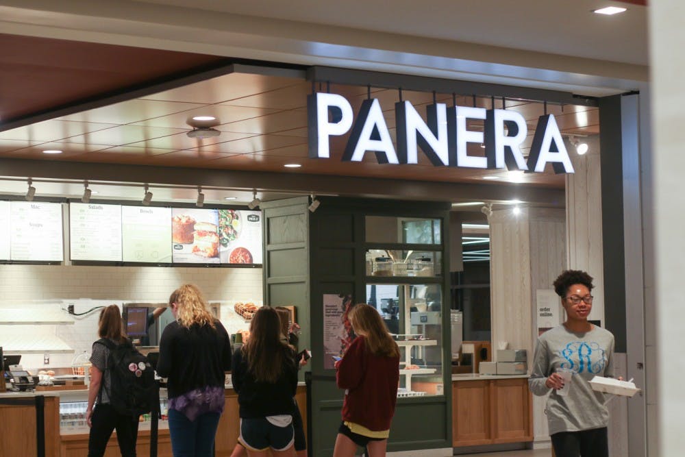 Students stand in line at Panera Bread.