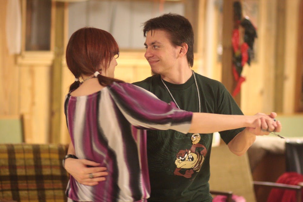 	<p>A pair dances contra at the Lake Murray Contra Hall</p>