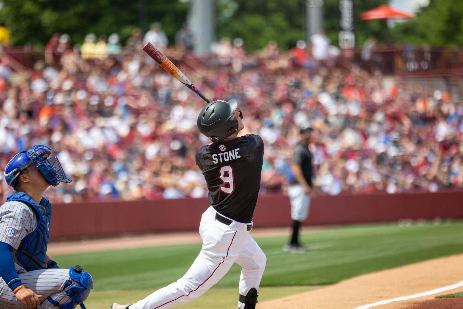 Sophomore outfielder Evan Stone tries to spot a batted ball during the series finale against the Gators on April 22, 2023. With a final score of 7-5, South Carolina won all three games over Florida in the series.