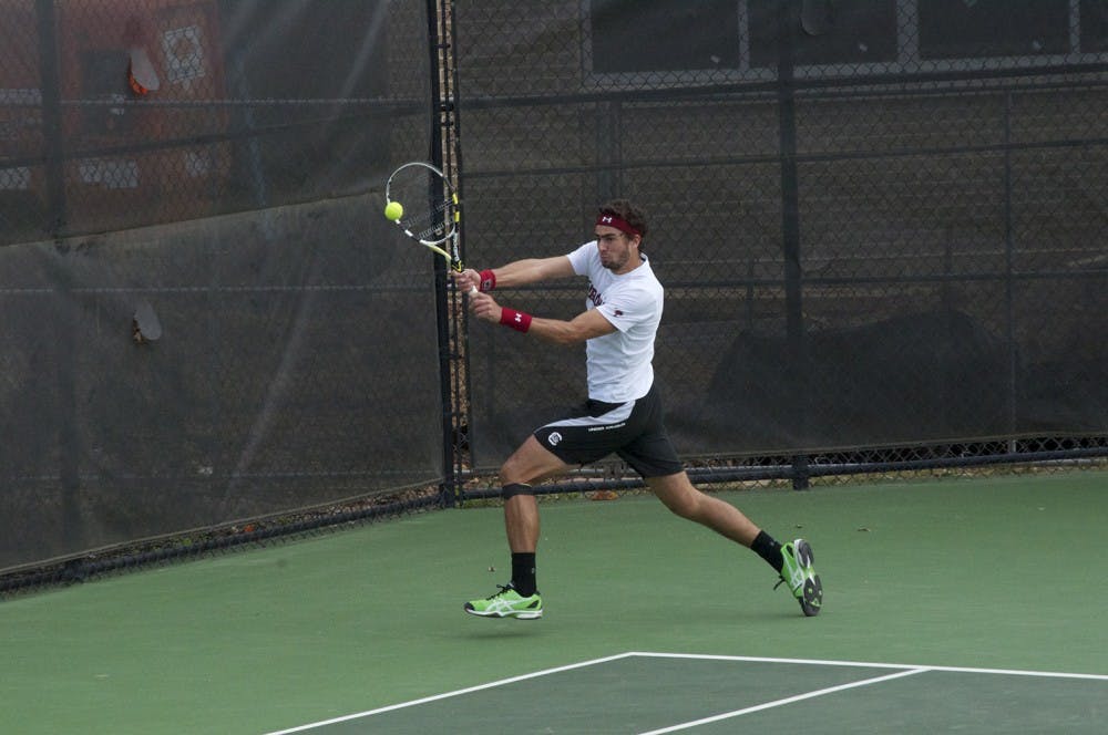 	<p>Sophomore Thiago Pinheiro (pictured) was able to cheer on sophomore teammate Kyle Koch during a break in his match.</p>