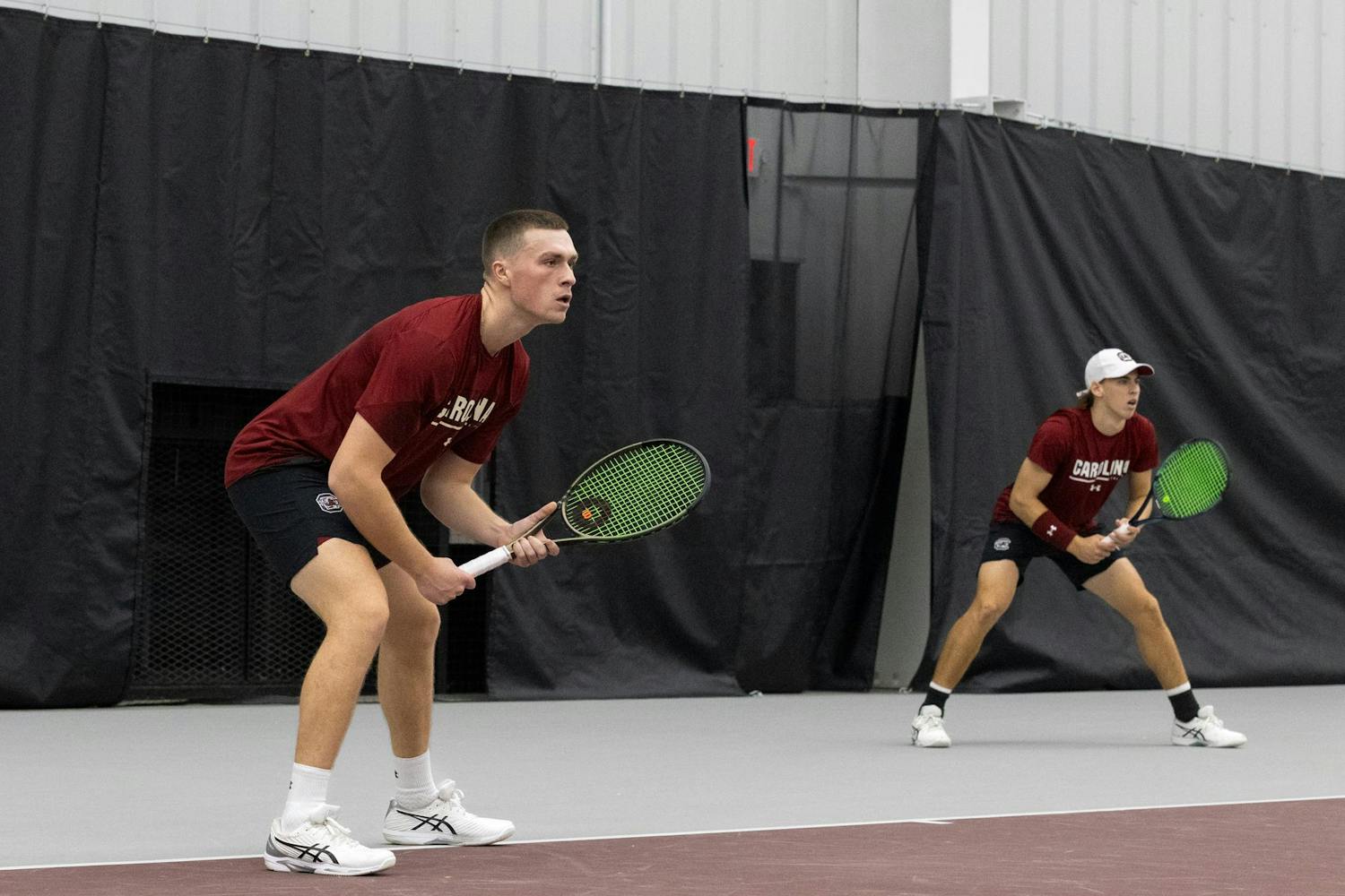 Senior James Story and junior Casey Hoole get into position during South Carolina’s match against NC State at the Carolina Indoor Tennis Center on Feb. 2, 2024. Hoole and Story won their first doubles match together this season 6-4.