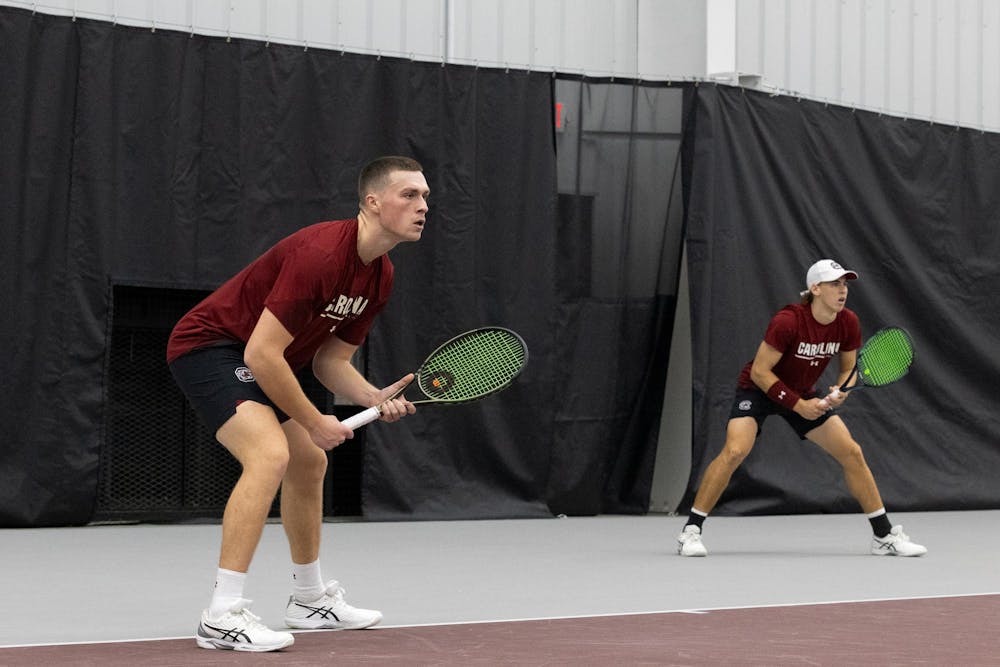 <p>Senior James Story and junior Casey Hoole get into position during South Carolina’s match against NC State at the Carolina Indoor Tennis Center on Feb. 2, 2024. Hoole and Story won their first doubles match together this season 6-4.</p>