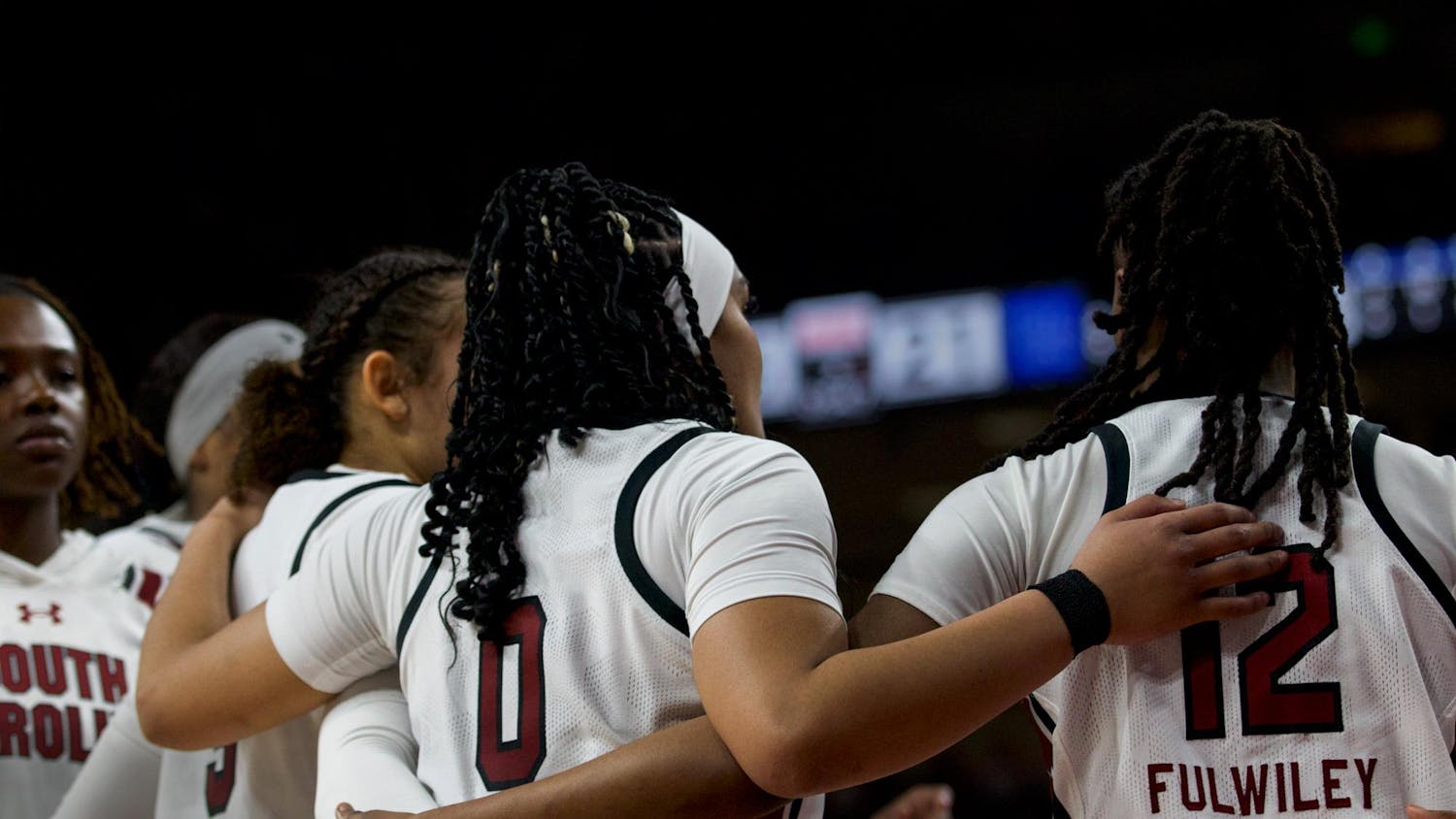 Freshman guard Tessa Johnson, senior guard Te-Hina Paopao and freshman guard MiLaysia Fulwiley huddle together during a timeout against the Kentucky Wildcats. The trio contributed 39 points during South Carolina’s 98-36 victory over Kentucky on Jan. 15, 2023.