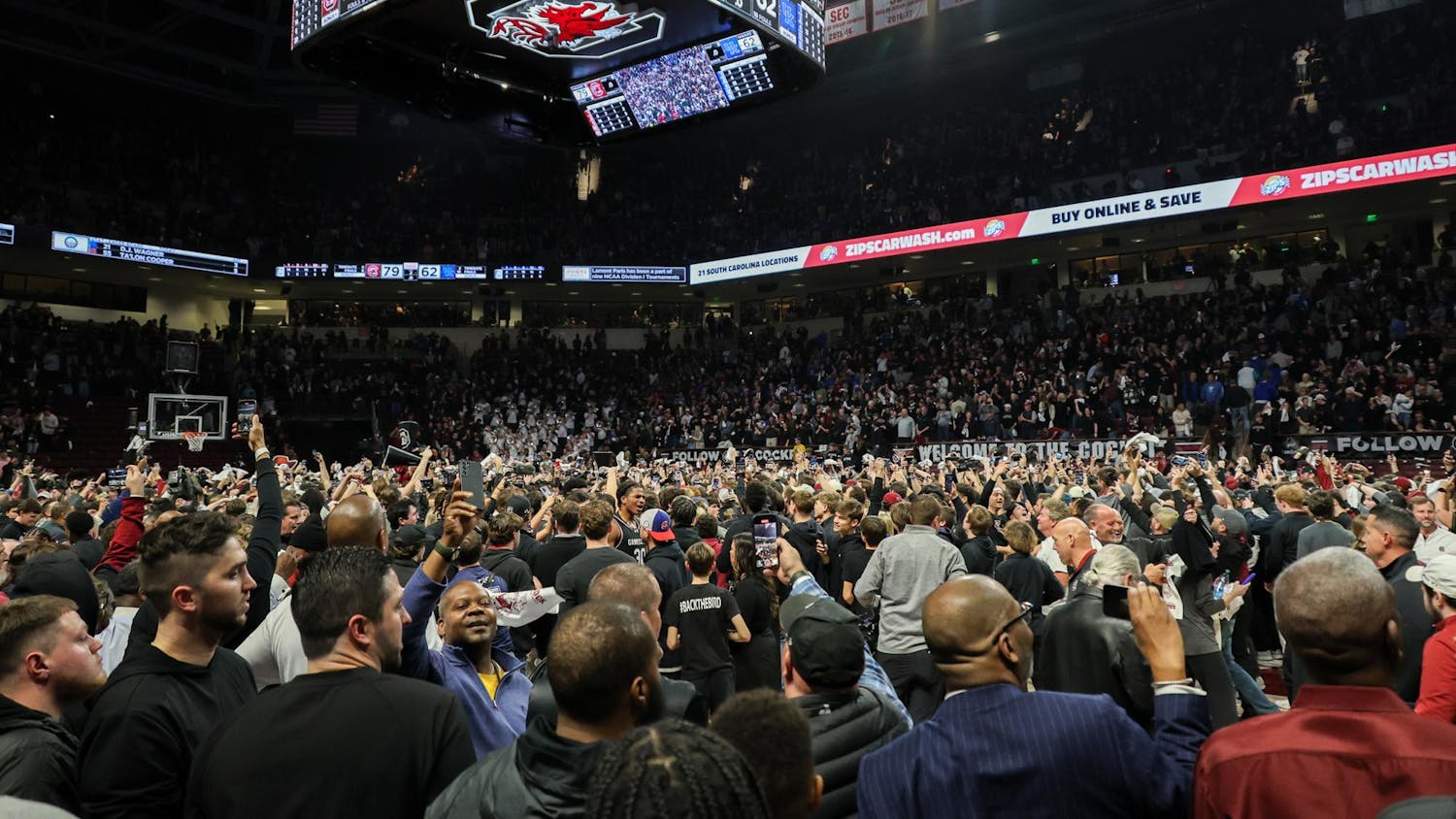 The South Carolina Gamecocks delivered a decisive upset over the No. 6 Kentucky Wildcats at a sold-out Colonial Life Arena on Jan. 23, 2024. The Gamecocks' defense played a large role in the 79-62 victory over the Wildcats. Fans across the arena stormed the court following the game, with players encouraging them to run onto the court. South Carolina is now 4-2 in conference play.