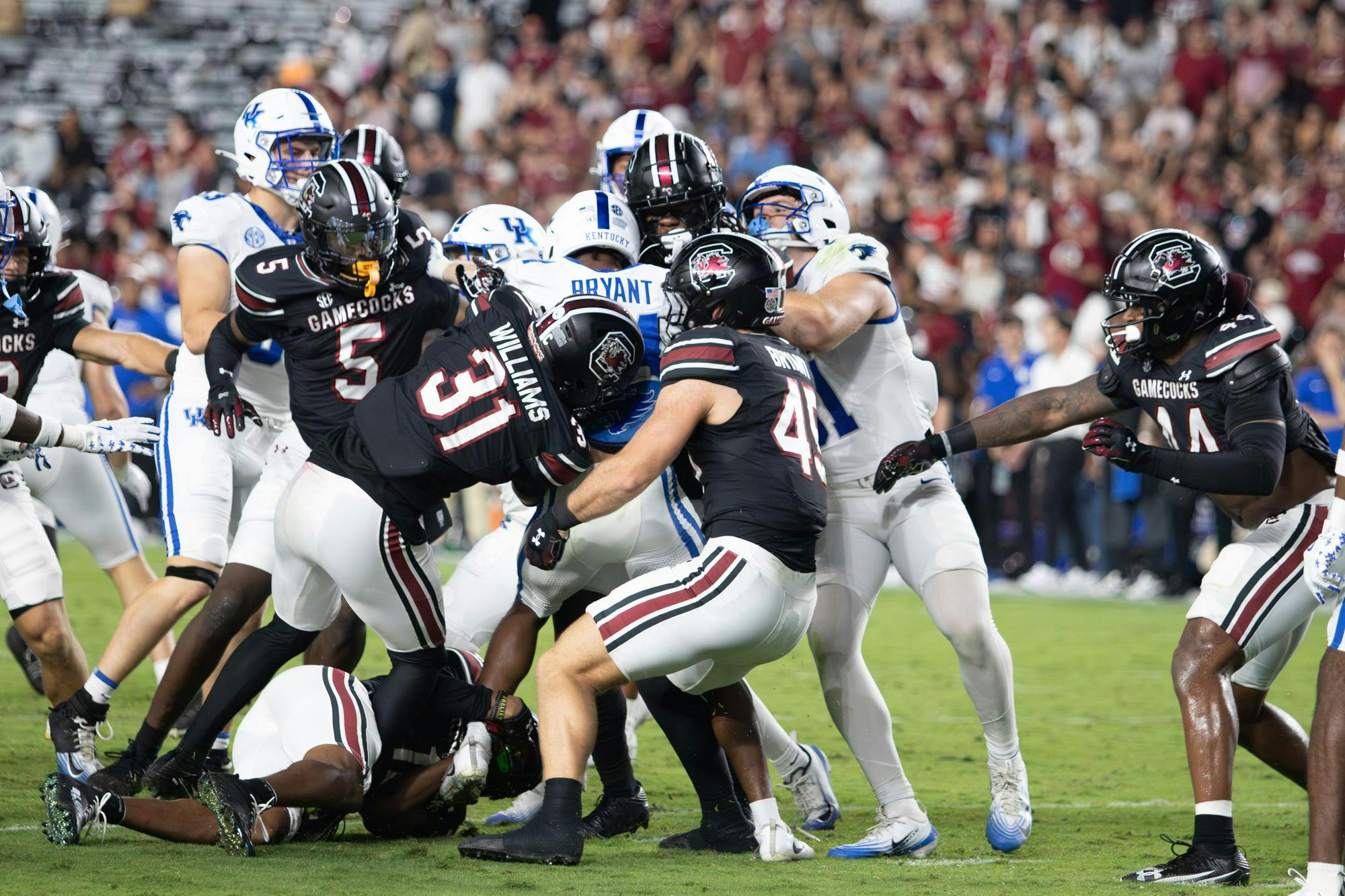 The Gamecock defense brings down the runner after a caught pass in the backfield against the University of Kentucky at Williams-Brice Stadium on Sept. 27, 2025. The Gamecocks’ defense finished with 62 total tackles against the Wildcats.