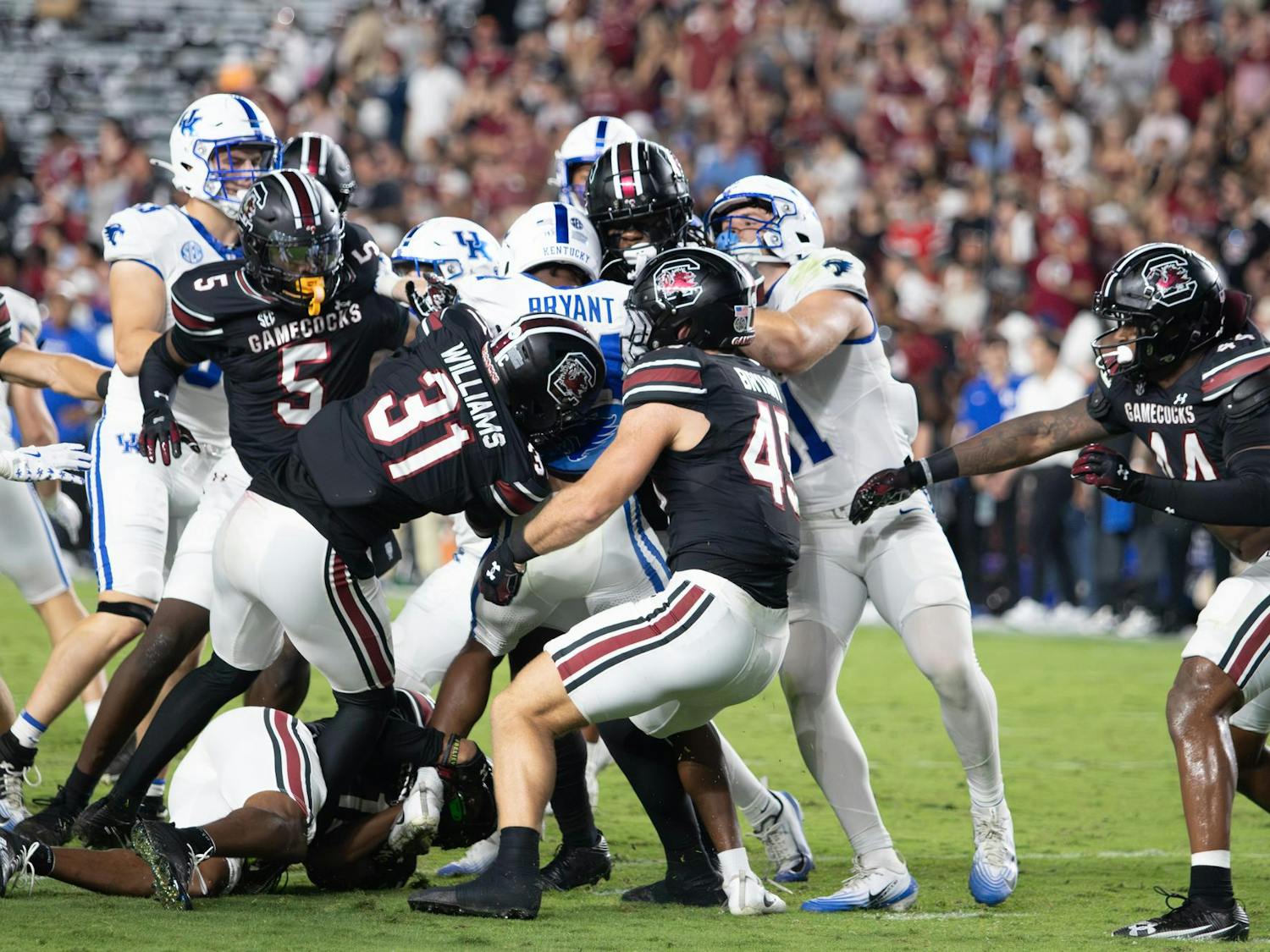 The Gamecock defense brings down the runner after a caught pass in the backfield against the University of Kentucky at Williams-Brice Stadium on Sept. 27, 2025. The Gamecocks’ defense finished with 62 total tackles against the Wildcats.