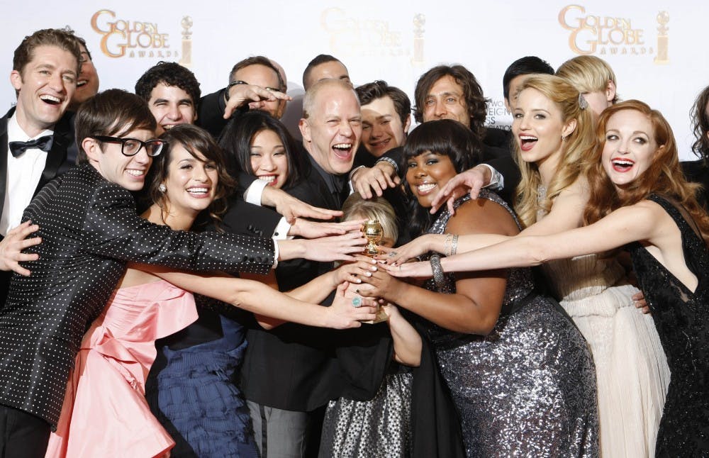 Ryan Murphy and the cast of &quot;Glee&quot; backstage at the 68th Annual Golden Globe Awards on Sunday, January 16, 2011, at the Beverly Hilton Hotel in Beverly Hills, California. (Brian van der Brug/Los Angeles Times/MCT)