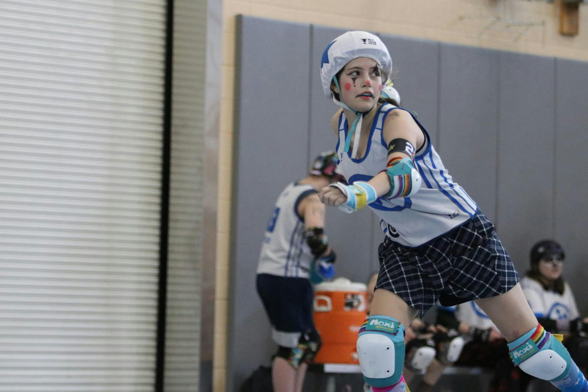 Raleigh Junior Raven skater Bronwen “Gloom Beetle” McCauley leads a jam against the Columbia Junior Killer B’s pack at St. Andrews Park on March 21, 2026. A pack is the largest number of blockers from both teams on the track. “Roller derby is something really special to me,” McCauley said. “I’ve been doing it for a couple of years now, and it has always helped me feel more confident in myself and my ability to defend myself.”