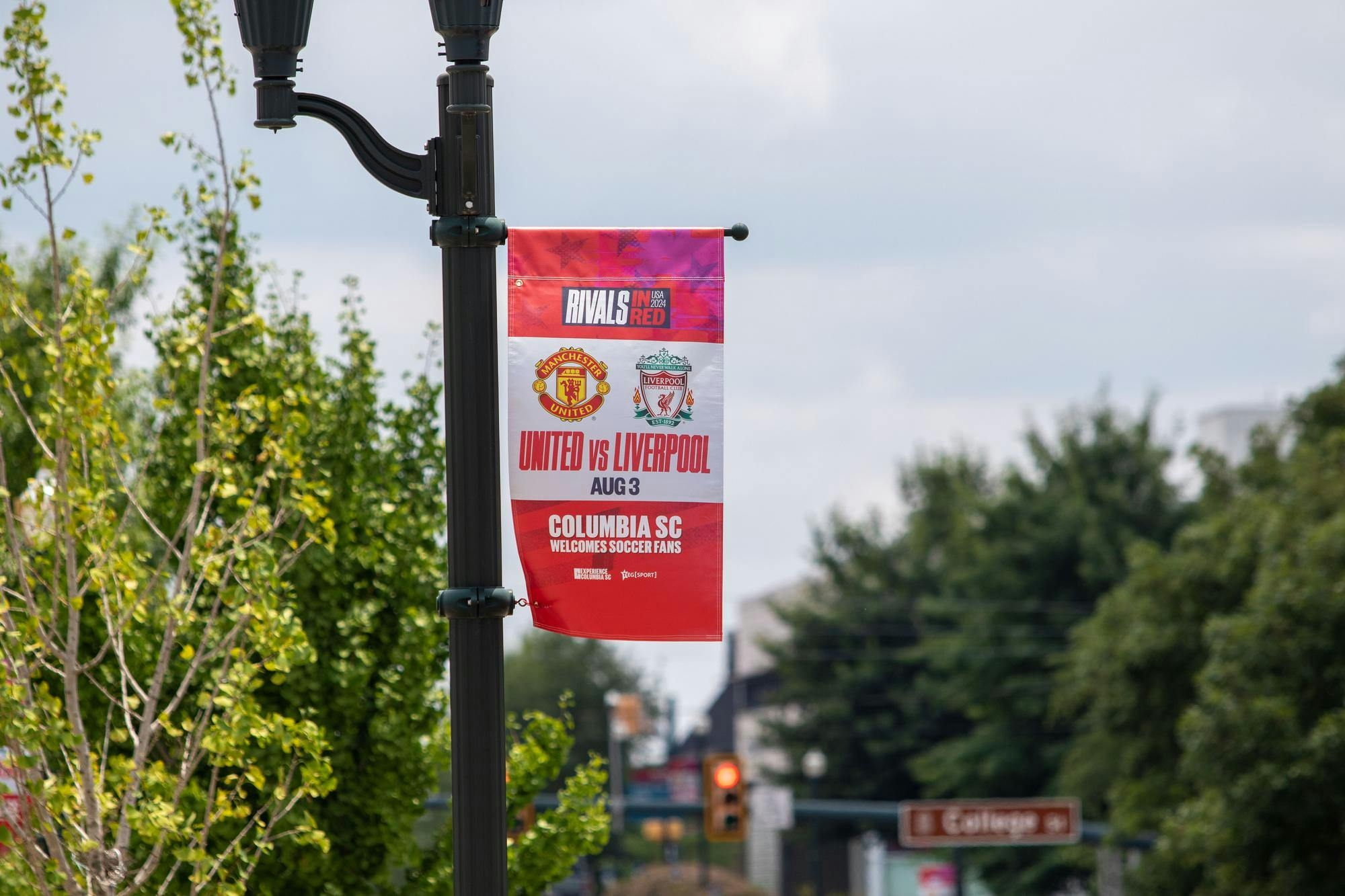 The Liverpool vs. Manchester United promotional banner is hanging on Sumter Street on July 27, 2024. The Liverpool vs. Manchester United game is set to be played at Williams-Brice Stadium on Aug. 2, 2024.
