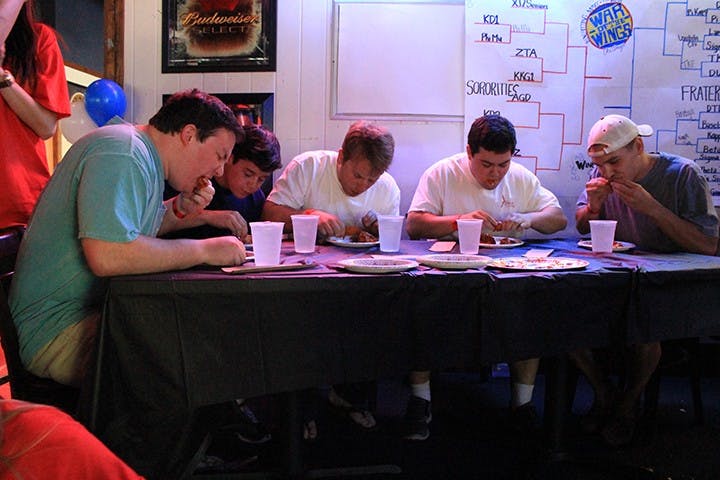 	Chi Omega sorority hosted its annual War of the Wings competition Wednesday at Wild Wing Cafe, where teams of students ate as many chicken wings as they could. Money raised for the event was donated to the Make-A-Wish Foundation.