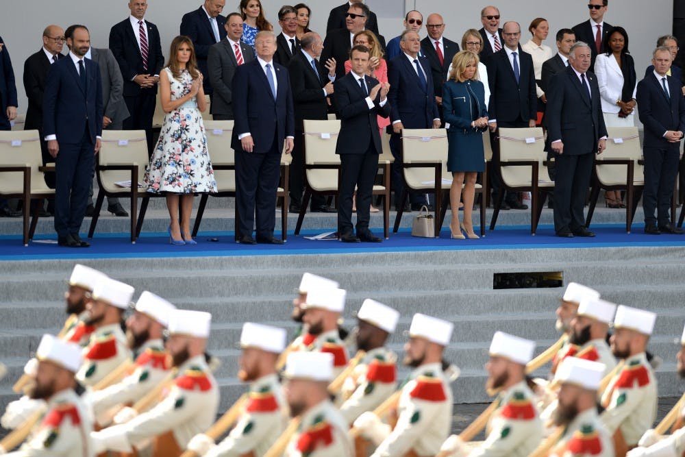 U.S. President Donald Trump, First Lady Melania Trump and French President Emmanuel Macron with Brigitte Macron attend the annual Bastille Day military parade on the Champs-Elysees avenue in Paris on July 14, 2017. (Lionel Hahn/Abaca Press/TNS)