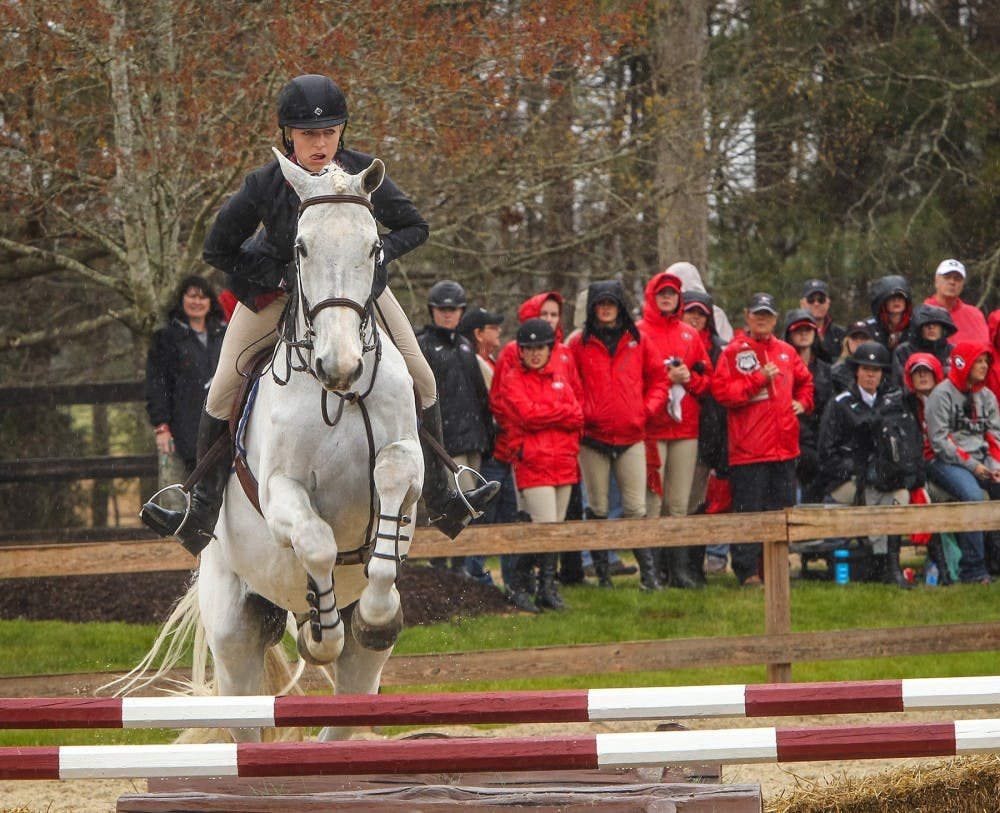 South Carolina&apos;s Samantha Kraus competes on Perfekt during the Equitation Over Fences competition against Texas A&amp;M in Blythewood, S.C., Friday, March 28, 2014. (Tim Dominick/The State/MCT)