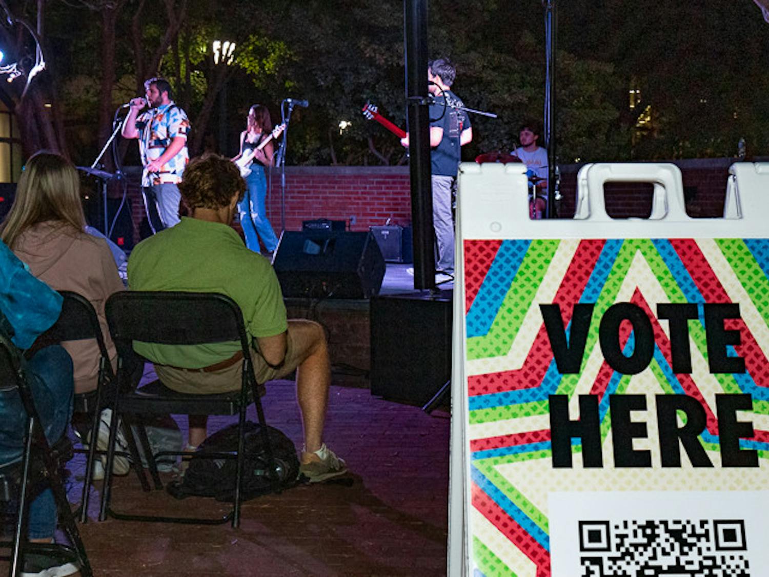 A sign with a QR code for spectators to vote for their favorite band at the annual Battle of the Bands on Oct. 5, 2022. The House Band was ultimately chosen as the winner of the musical competition.