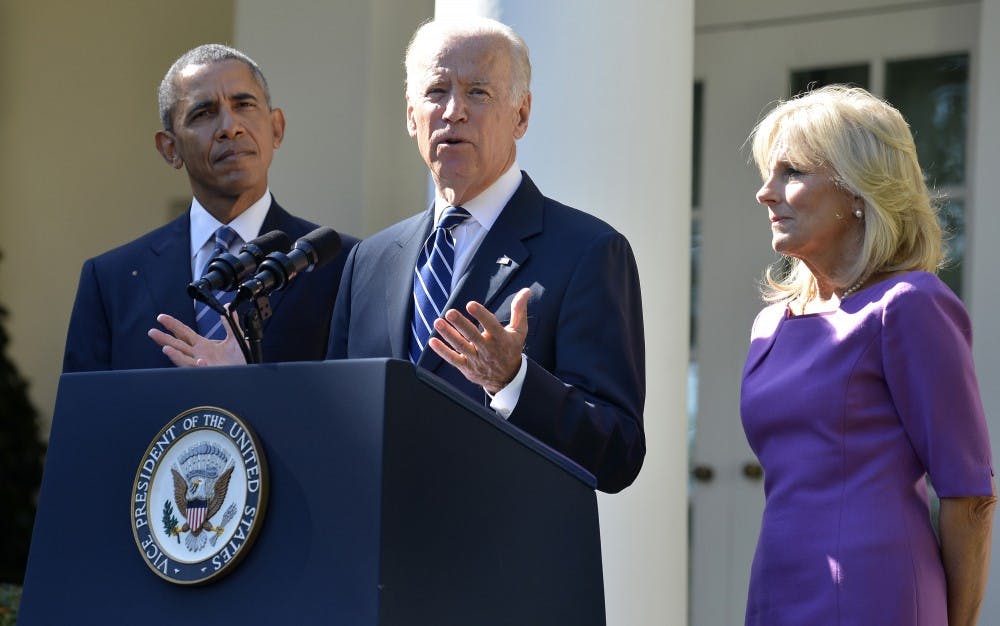 U.S. Vice President Joe Biden announces he will not be seeking the Democratic presidential nomination in 2016 as his wife Dr. Jill Biden and President Barack Obama listen on in the Rose Garden of the White House on Wednesday, Oct. 21, 2015. (Mike Theiler/CNP/Zuma Press/TNS)