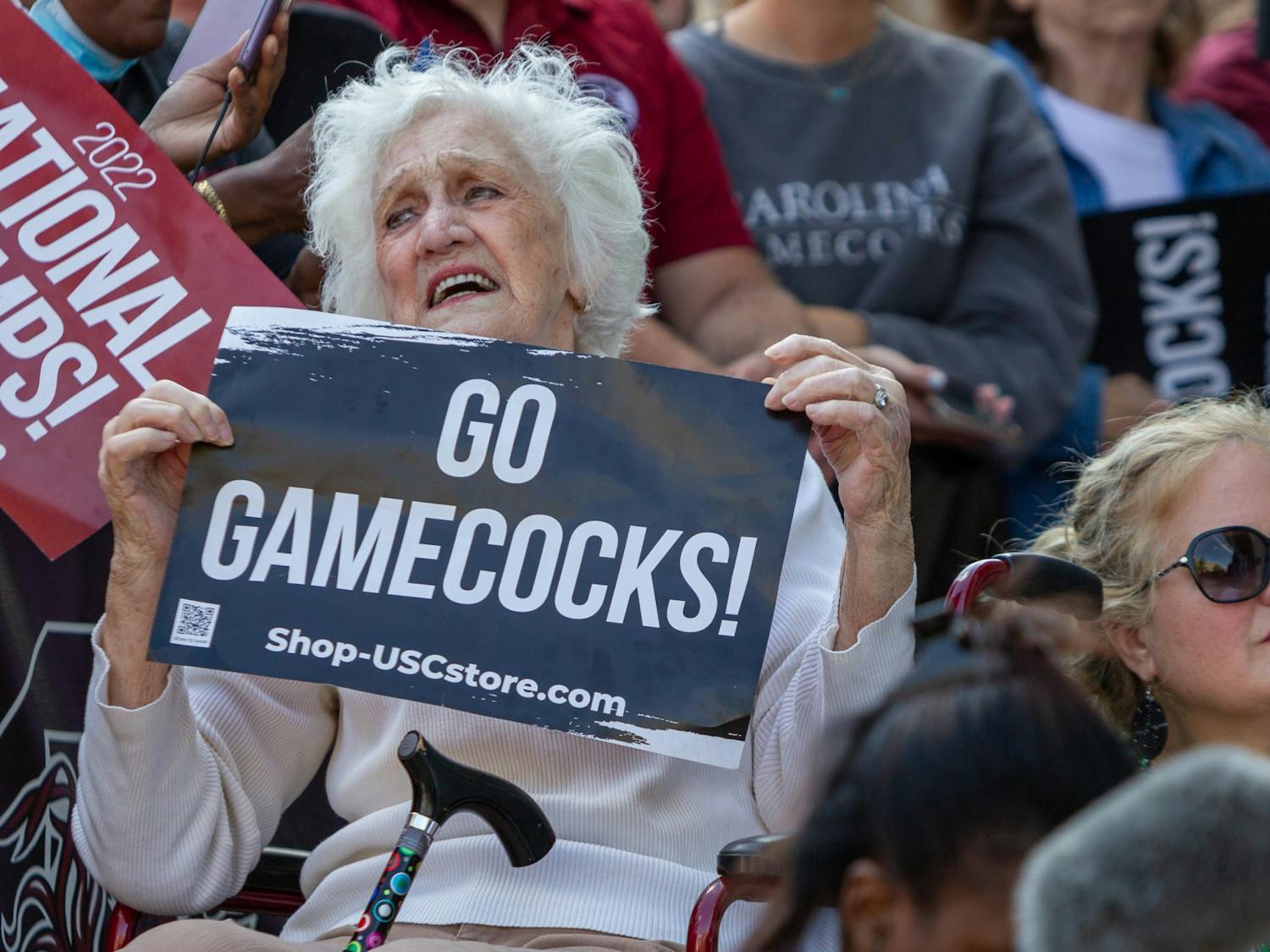 A South Carolina fan holds a sign outside of Colonial Life Arena on April 4, 2022. The arena was crowded with fans in support of the women's basketball team.