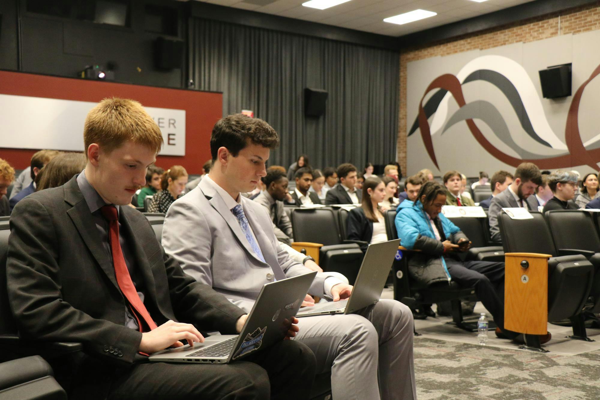 Members of student senate listen and take notes as general orders are stated on Feb. 4, 2026, in the Russell House Theater. Senators were able to discuss any new legislation that was passed or denied during their meetings.