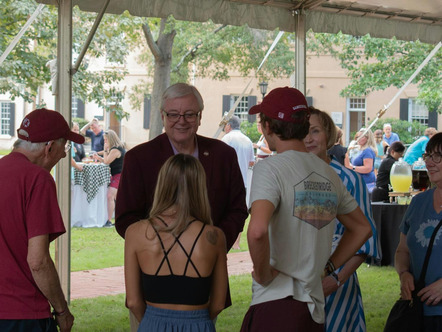 University of South Carolina President Michael Amiridis and First Lady Ero Aggelopoulou-Amiridis greet families on the Horseshoe on Sept. 20, 2024. The event was one of many put on by the university for Family Weekend.