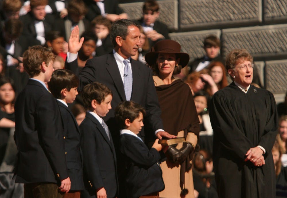 Mark Sanford is surrounded by his family as he is sworn in as governor of South Carolina by State Supreme Court Justice Jean Toal on Jan. 10, 2006, in Columbia, South Carolina. (C.A. Berry/The State/MCT))