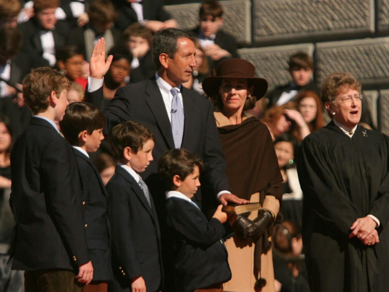 Mark Sanford is surrounded by his family as he is sworn in as governor of South Carolina by State Supreme Court Justice Jean Toal on Jan. 10, 2006, in Columbia, South Carolina. (C.A. Berry/The State/MCT))