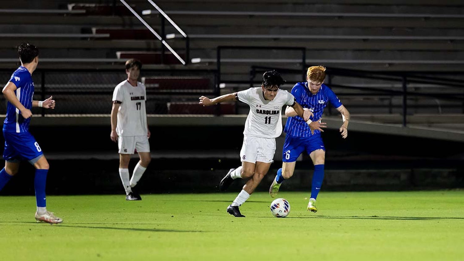 Freshman midfielder Rocky Perez keeps the ball in his possession while fighting off a Kentucky Wildcat opponent at Stone Stadium on Nov. 1, 2022. Perez has been apart of the starting lineup all season.