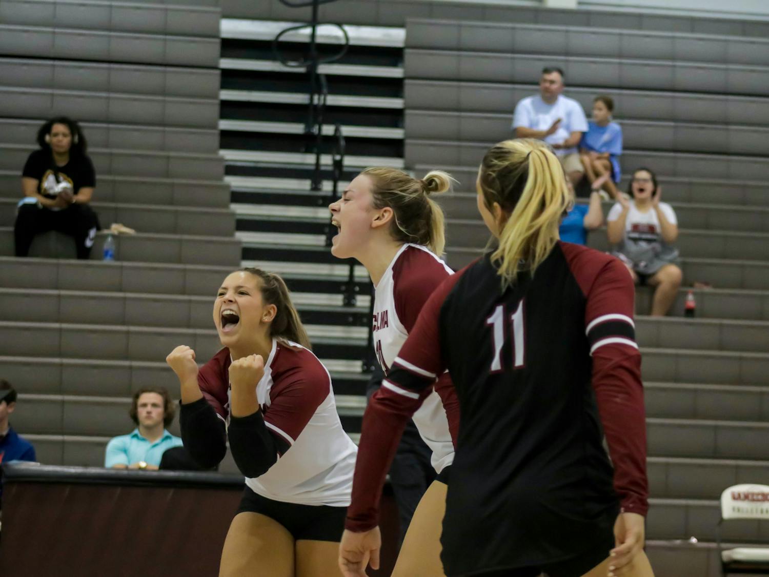 Members of the South Carolina volleyball team celebrate a point during the Carolina Classic in 2022.&nbsp;