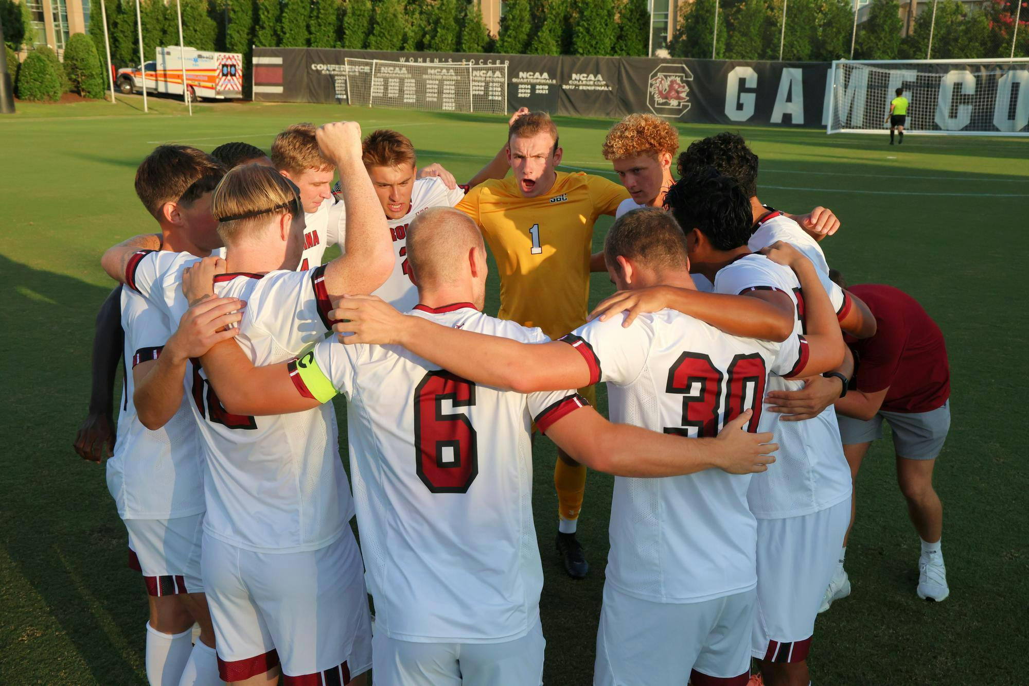 The University of South Carolina men's soccer team huddles before a match on Aug. 22, 2024 at Stone Stadium. The team has a 4-1-2 record so far this season.