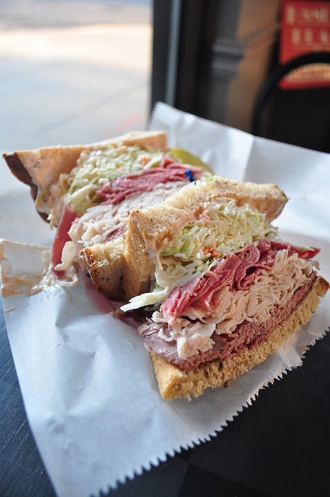 Hampton's take on the "Sloppy Joe", the Downtown Deluxe--three meats, slaw, and sweet dressing