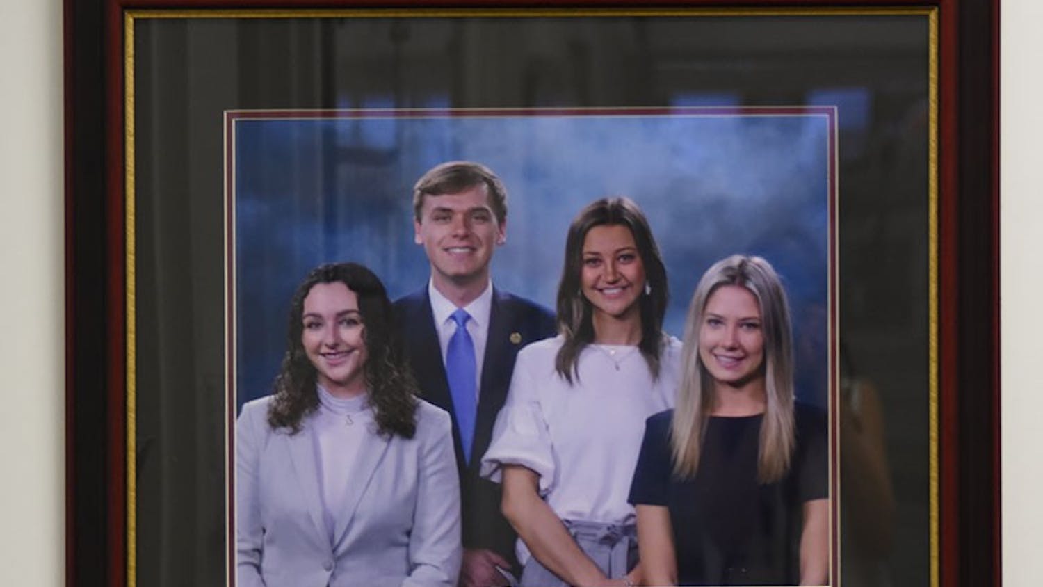 A framed picture of 2021-2022 Student Government leaders — Speaker of the House Morgiana McDevitt, Student Body President Alex Harrell, former treasurer Kate Turner and Vice President Emily Dengler. 