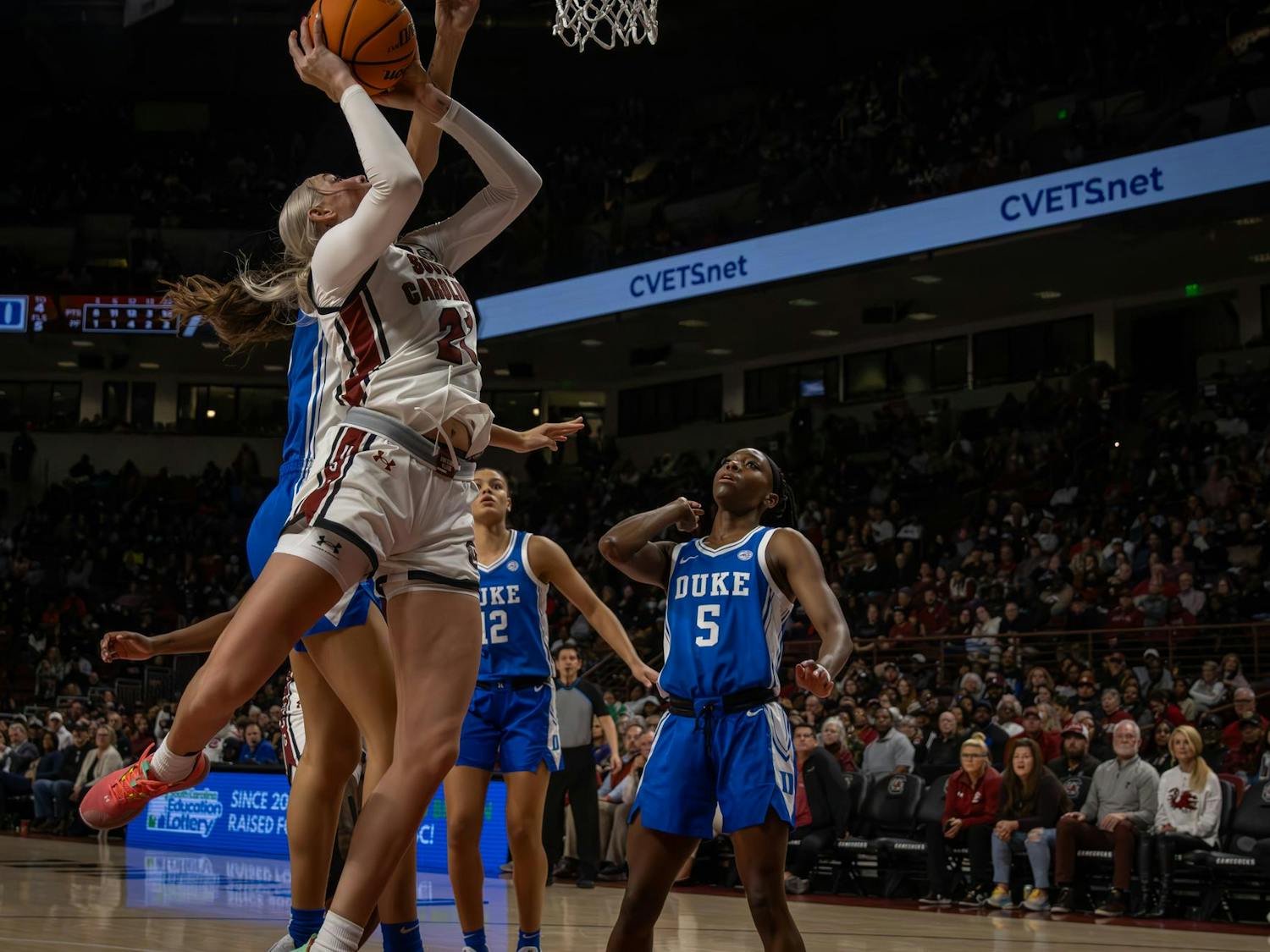 Junior forward Chloe Kitts goes up for a layup against Duke defenders on Dec. 5, 2024. Kitts scored 21 points on the night.