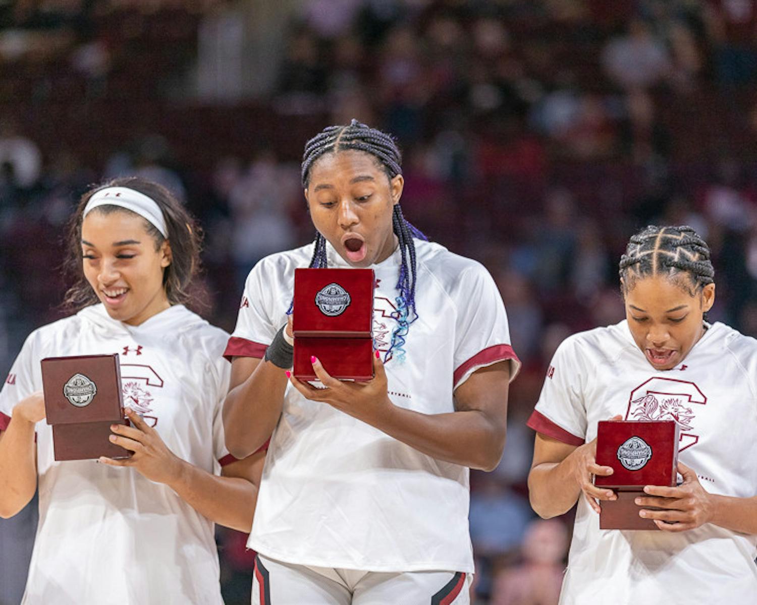 Senior forward Aliyah Boston (center) reacts to seeing her National Championship ring. South Carolina played East Tennessee State on Nov. 7, 2022. The Gamecocks beat East Tennessee State 101- 31.