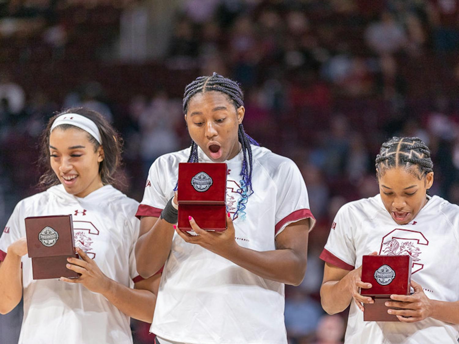 Senior forward Aliyah Boston (center) reacts to seeing her National Championship ring. South Carolina played East Tennessee State on Nov. 7, 2022. The Gamecocks beat East Tennessee State 101- 31.