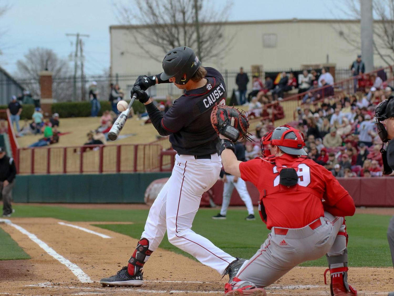 Senior infielder Tyler Causey swings at the ball during the Gamecocks' 14-0 victory over Miami-Ohio on Feb. 18, 2024. Causey had 3 hits during the three-game opening series at Founders Park.