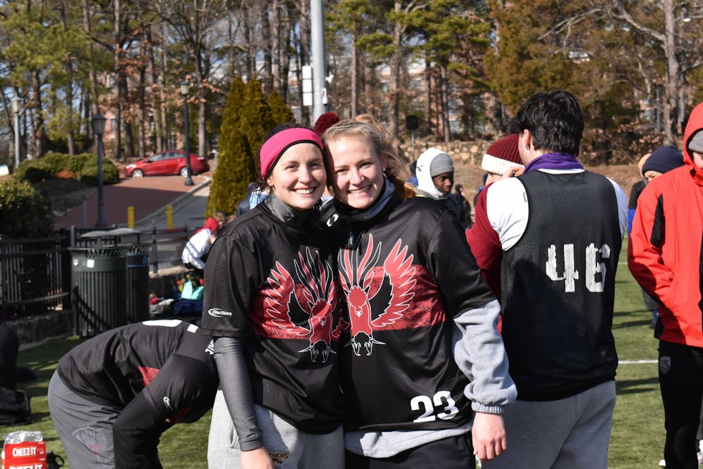 <p>Libby Pung and Colleen Morton of the Gamecock Ultimate Frisbee club team stand in their jerseys at the Carolina versus Chapel Hill Kickoff on Jan. 29, 2022. &nbsp;The team welcomes female players, Morton and Pung, to its traditionally all-male roster.</p>