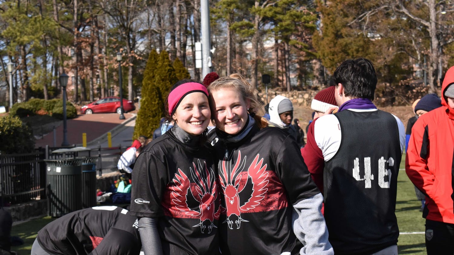 Libby Pung and Colleen Morton of the Gamecock Ultimate Frisbee club team stand in their jerseys at the Carolina versus Chapel Hill Kickoff on Jan. 29, 2022. &nbsp;The team welcomes female players, Morton and Pung, to its traditionally all-male roster.