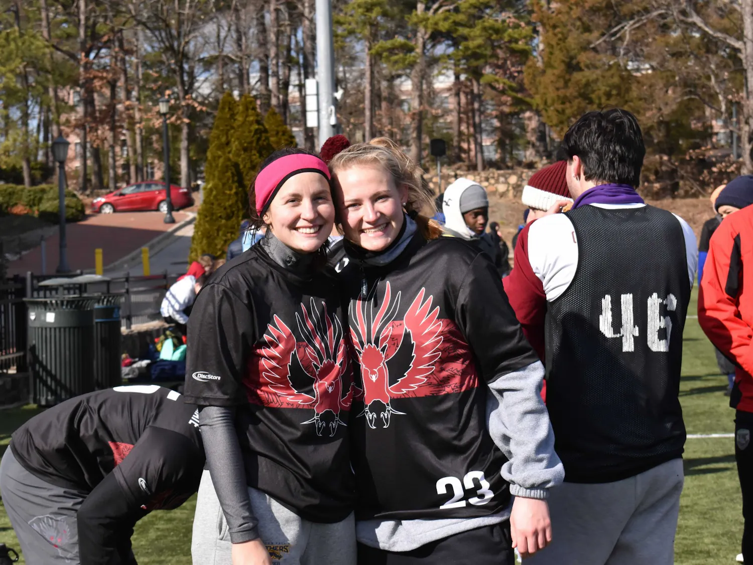 Libby Pung and Colleen Morton of the Gamecock Ultimate Frisbee club team stand in their jerseys at the Carolina versus Chapel Hill Kickoff on Jan. 29, 2022. The team welcomes female players, Morton and Pung, to its traditionally all-male roster.