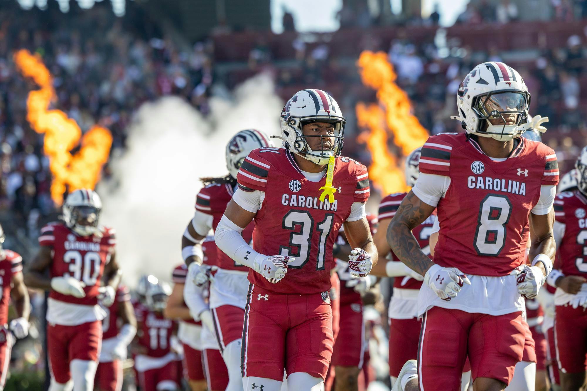 Redshirt junior defensive back Peyton Williams (center) runs out during South Carolina’s entrance before playing Alabama on Oct. 25, 2025, at Williams-Brice Stadium. The Gamecocks lost to the Crimson Tide 29-22.