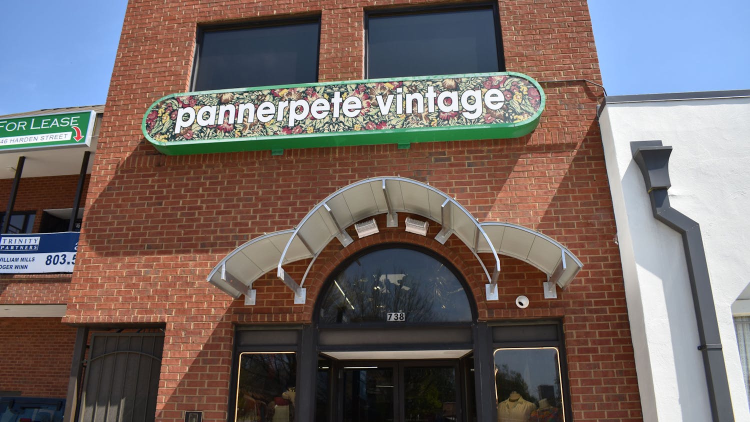 A photo of the outside of Pannerpete Vintage clothing store on Harden Street in Five Points on March 23, 2023. The store is open daily from 11 a.m. to 7 p.m., and features a variety of vintage clothing and jewelry.