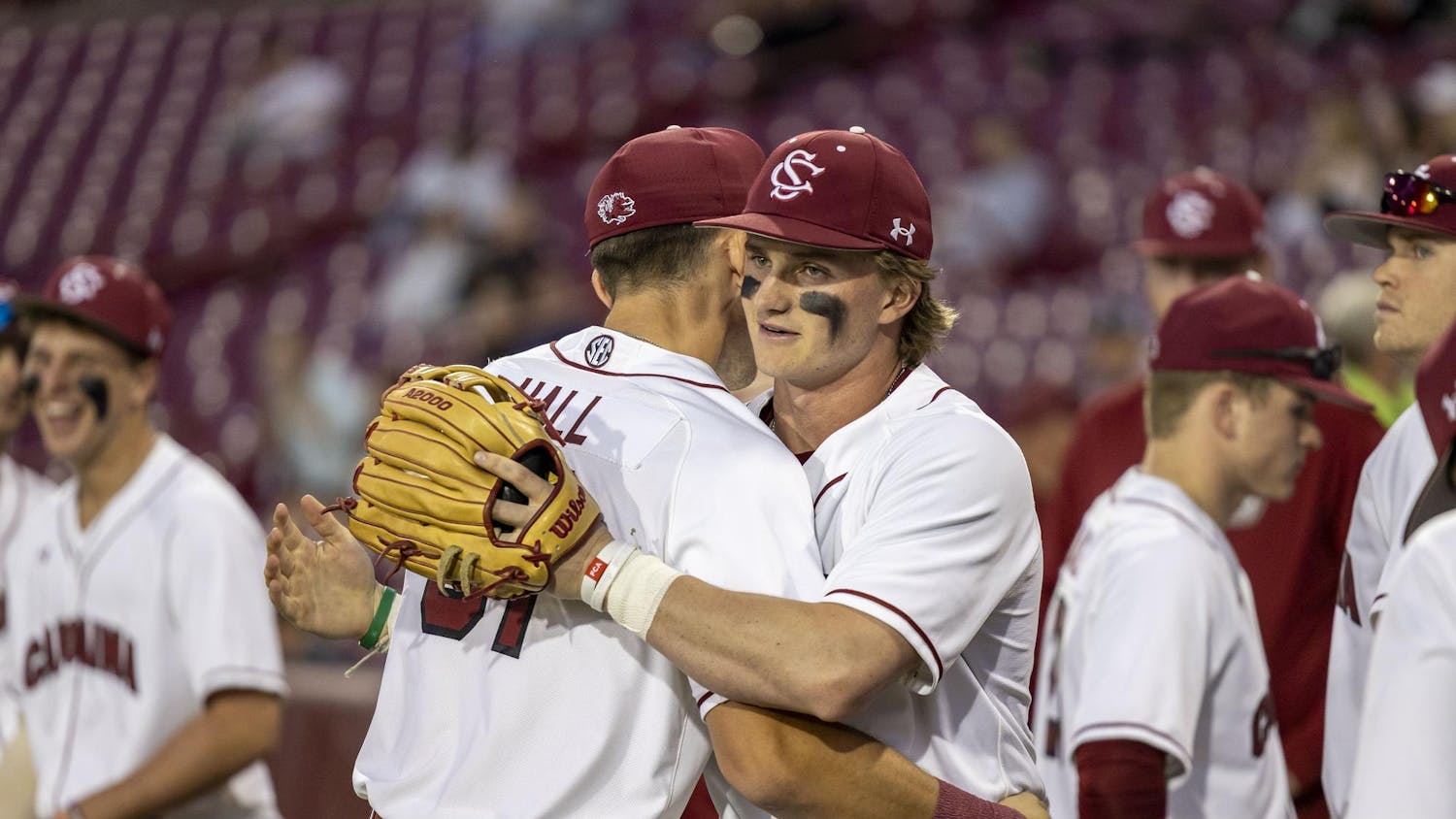 Junior outfielder Nathan Hall (left) hugs teammate sophomore infielder Nolan Nawrocki ahead of the South Carolina baseball team taking on Gardner-Webb at Founders Park on Feb. 25, 2025. The Gamecocks moved to 9-0 on the season after defeating the Bulldogs 14-4.
