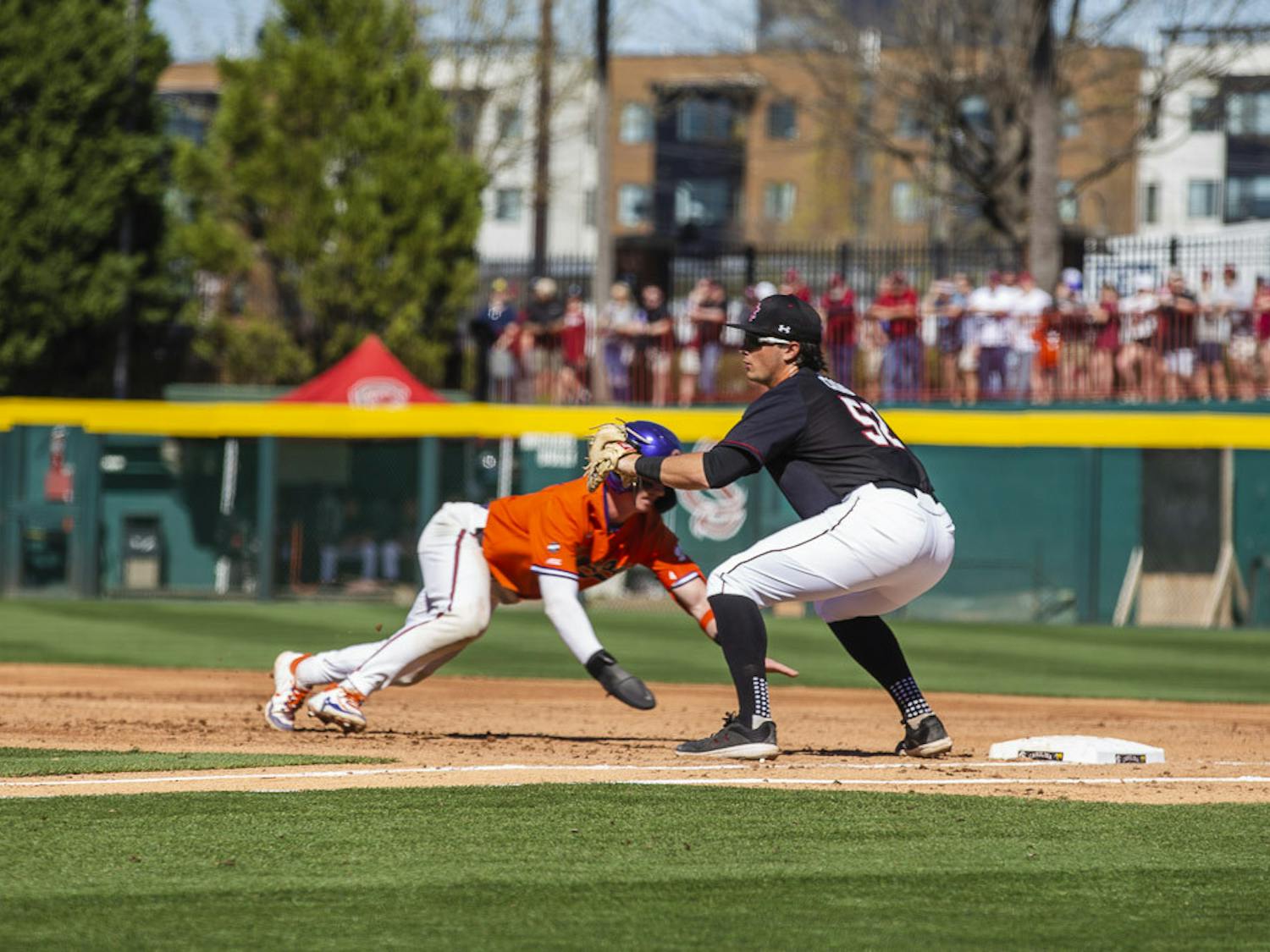 Junior first baseman Gavin Casas attempts to tag out Clemson's runner during the third game of the series between South Carolina and Clemson on March 5, 2023. The Gamecocks beat the Tigers 7-1, winning 2-1 in the series.&nbsp;