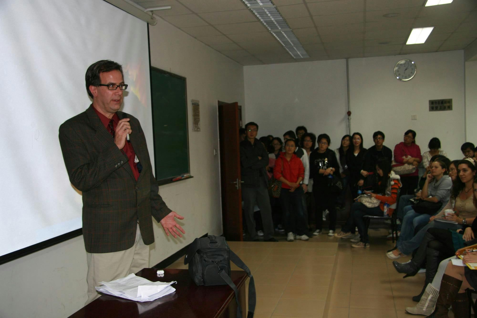 Professor Northrop Davis gives a lecture on the interplay between Hollywood movies, TV and animation, Japanese manga and anime and Chinese animation at a university in Beijing, China.