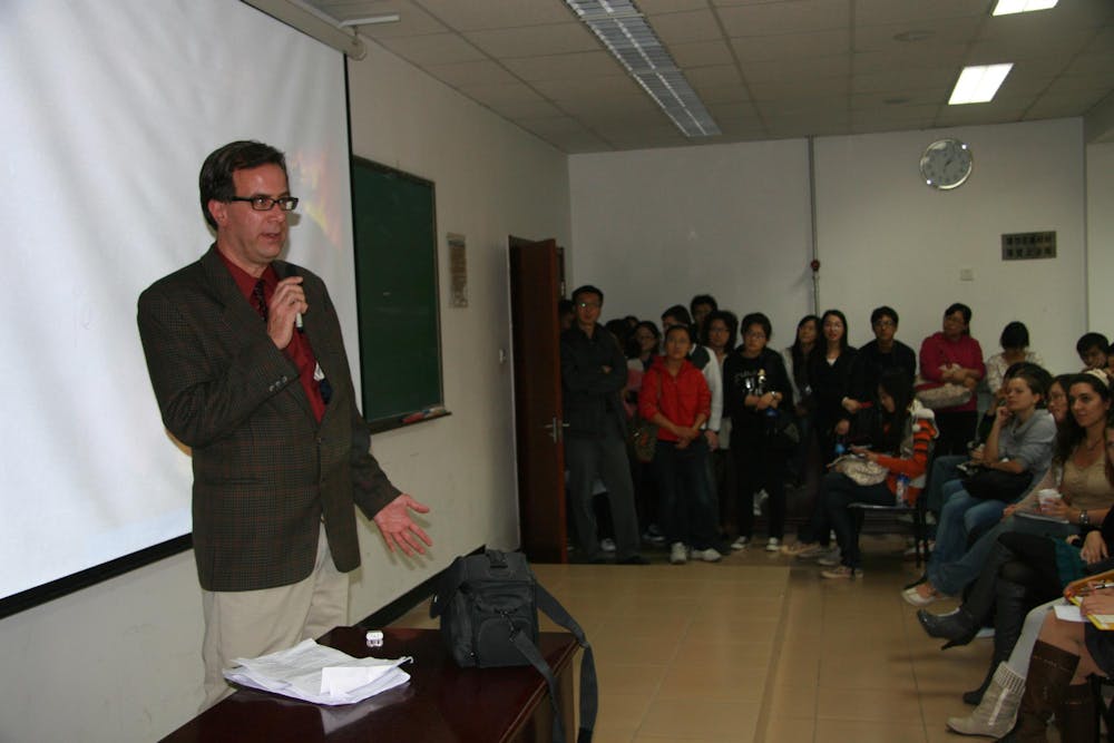 <p>Professor Northrop Davis gives a lecture on the interplay between Hollywood movies, TV and animation, Japanese manga and anime and Chinese animation at a university in Beijing, China.</p>