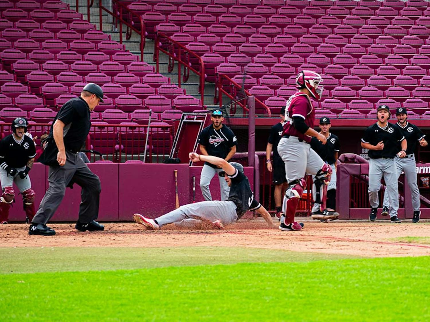 Junior infielder Braylen Wimmer slides home and scores a run for the Black team during a Garnet and Black scrimmage on Nov. 2, 2022. During the 2022 season, Wimmer scored a total of 38 runs and had a batting average of .312.