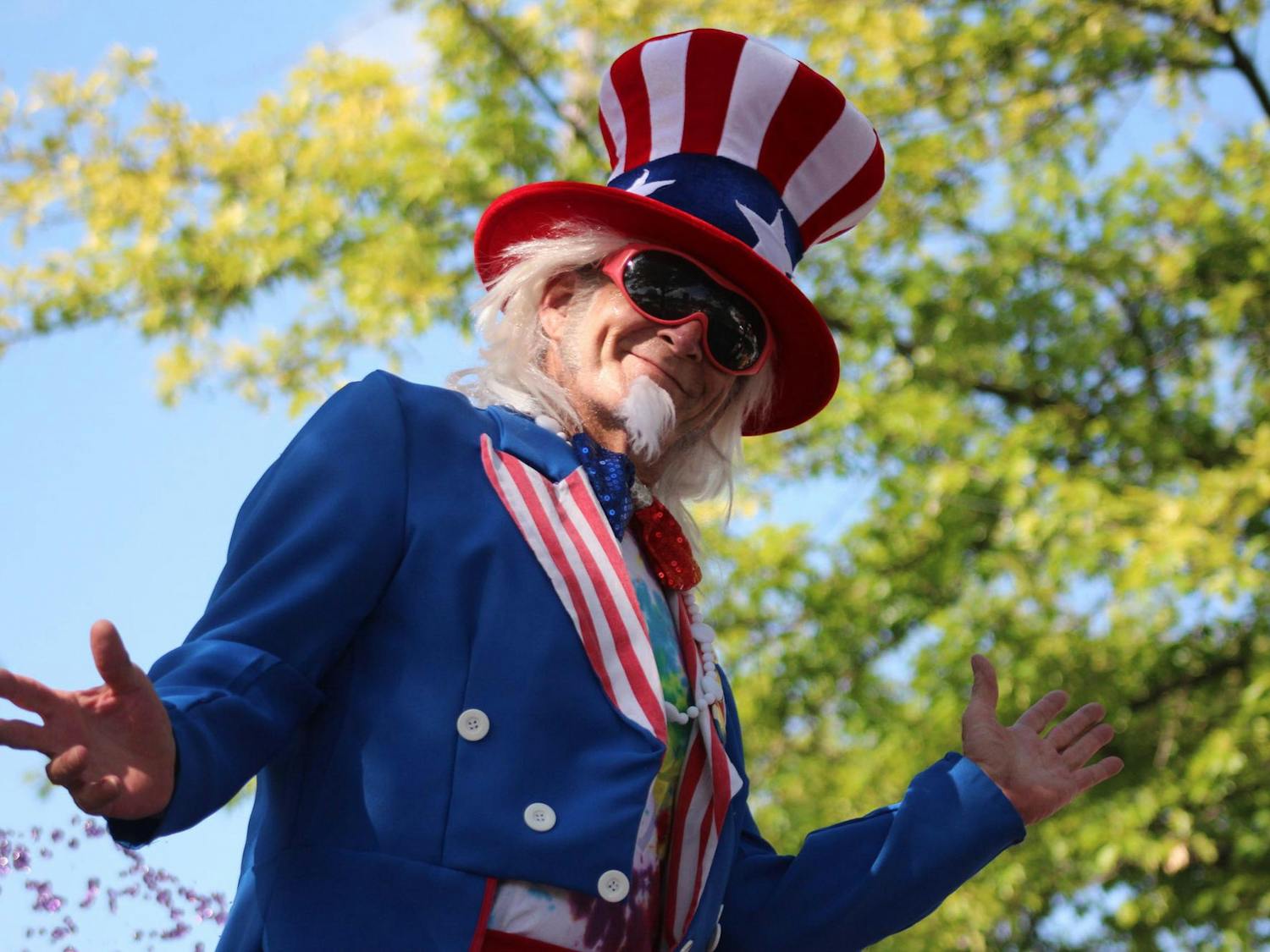 An attendee of JerryFest dressed up as Uncle Sam looks at the camera with his hands raised on Oct. 6, 2024. JerryFest was originally started by Loose Lucy’s.