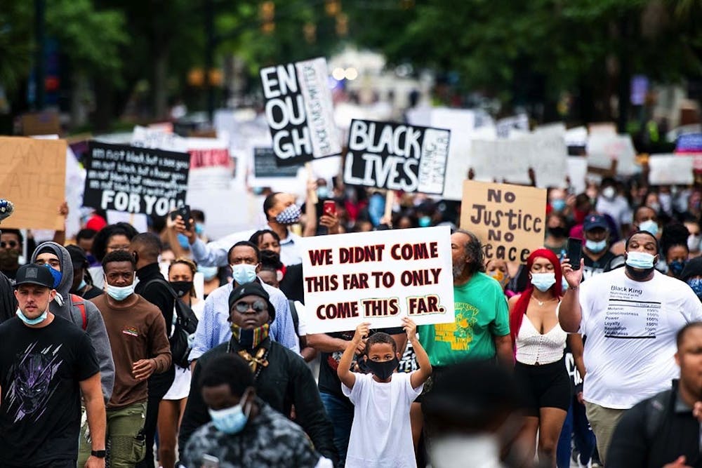 <p>A photograph of the Black Lives Matter march at the State Capital in 2020 in response to the murder of George Floyd. This image was taken by Sean Rayford, one of the five photojournalists featured in the "Hindsight 2020" exhibit at the Columbia Museum of Art.</p>