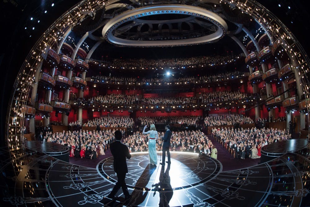 Nicole Kidman and Chiwetel Ejiofor presenting during the 87th Academy Awards at the Dolby Theatre in Hollywood on February 22, 2015. "I always love going to the Oscars," Kidman said. "It’s nice to be invited." (T. Wawrychuk J. Murphy/AMPAS/Zuma Press/TNS)