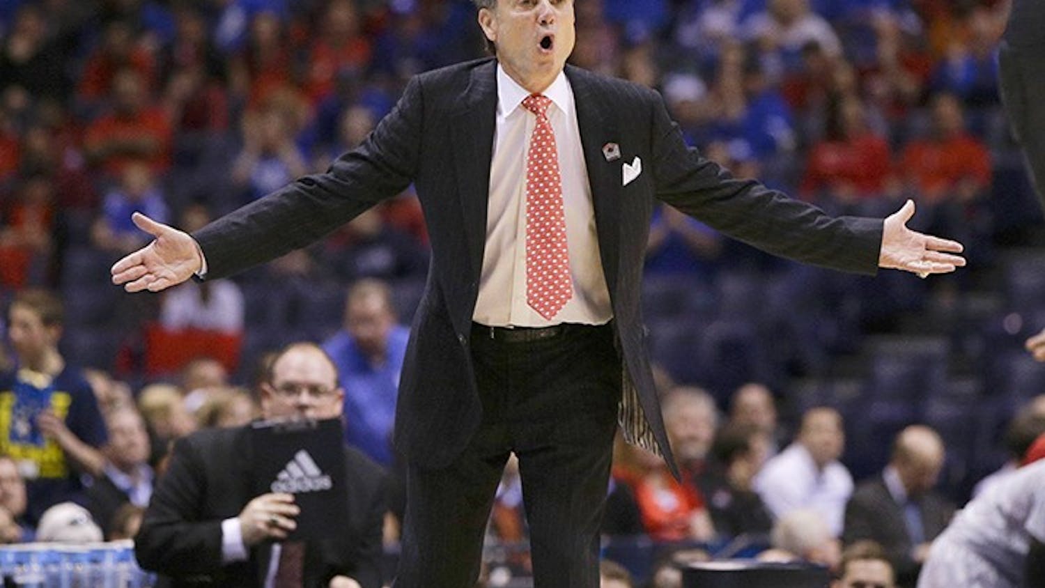Louisville head coach Rick Pitino questions a call during action against Kentucky in the NCAA Tournament&apos;s Midwest Region semifinal at Lucas Oil Stadium in Indianapolis on Friday, March 28, 2014. (Mark Cornelison/Lexington Herald-Leader/MCT)